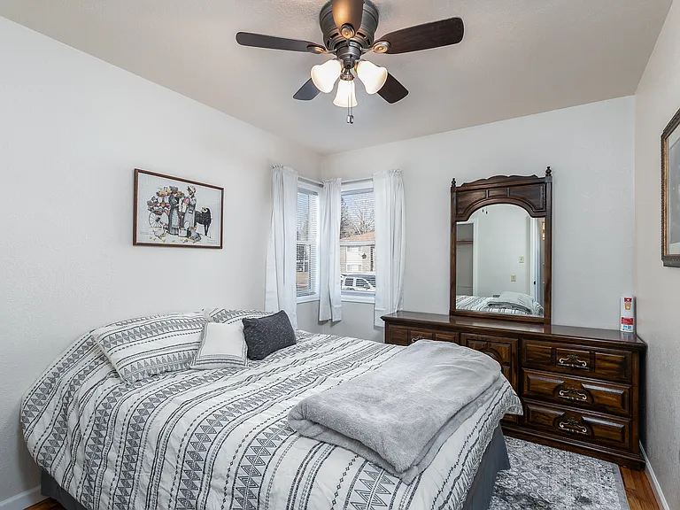 Queen bed master bedroom, dresser and pictures not included.