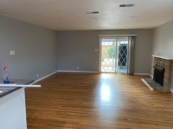 Sliding door to backyard. Gazebo in ostio