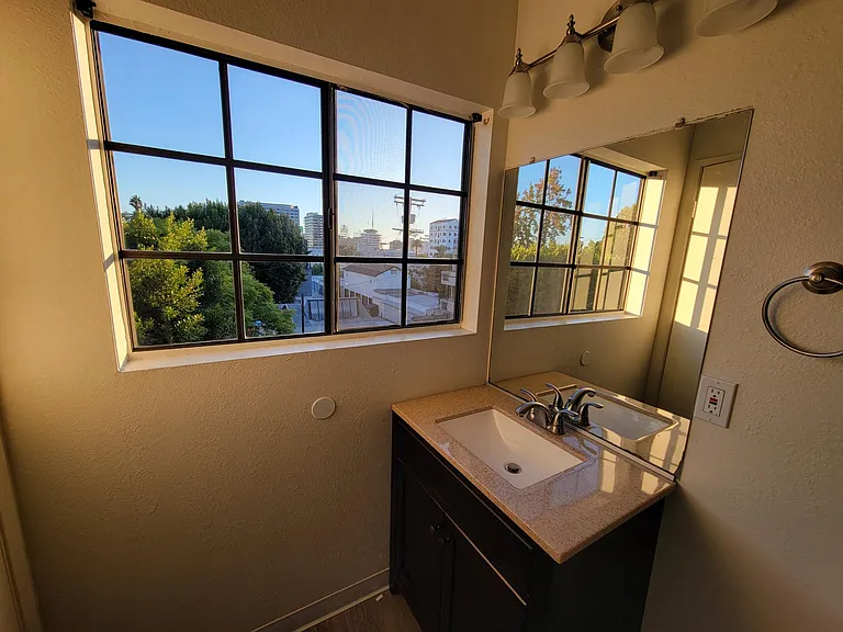 Bedroom #2 vanity and window view of Hollywood Skyline