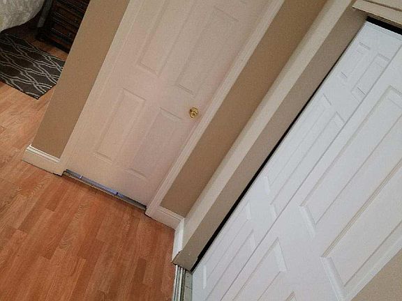 master bedroom with door to the bathroom