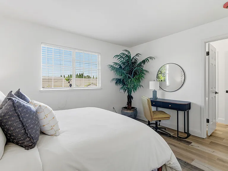 Stylish bedroom with plenty of natural light and modern comforts