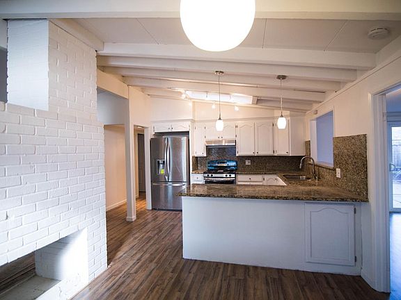 in front of the beautiful kitchen