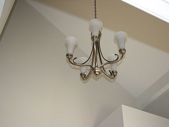 Chandelier above front door