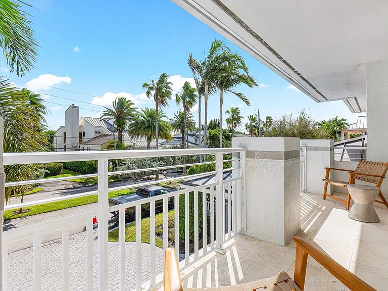 Private balcony with comfortable seating, perfect for enjoying morning coffee and scenic views.