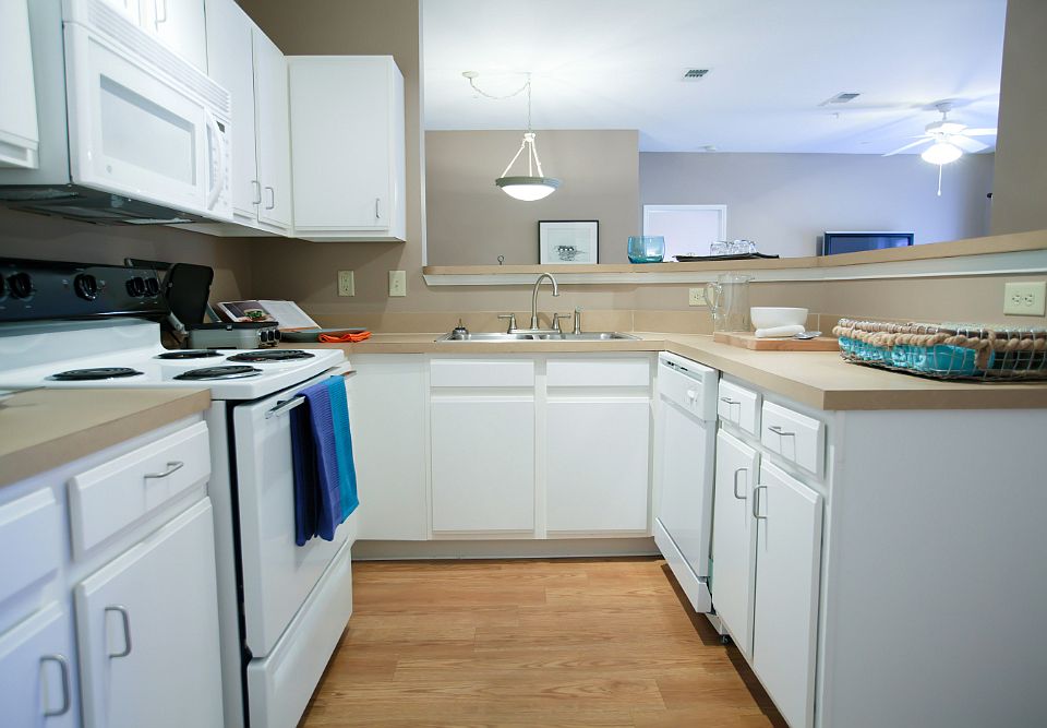 Upgraded Kitchen with New Modern White Cabinets