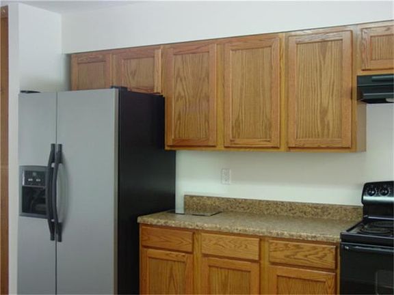 Black and stainless steel appliances Refrigerator stays