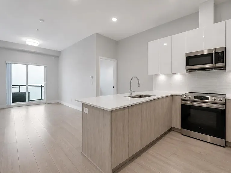 5486 199a St #520 — Photo 1