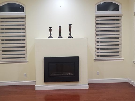Living Room fireplace, gas fired.