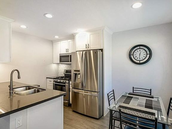 Kitchen and dining. 

Note: shows the old fridge. We have a new one as of Nov ''22.