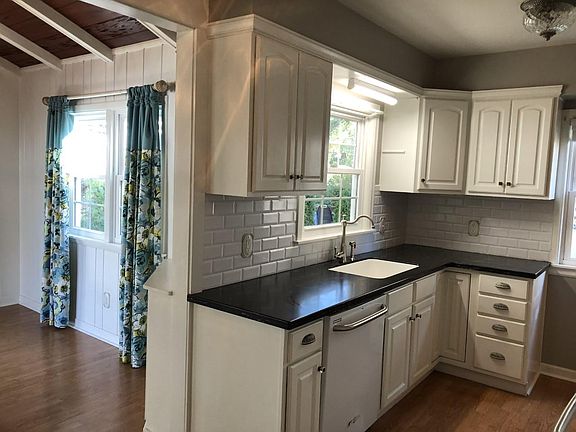 Kitchen open to dining/sunroom