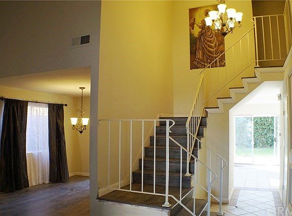 elegant stair case- new chandelier