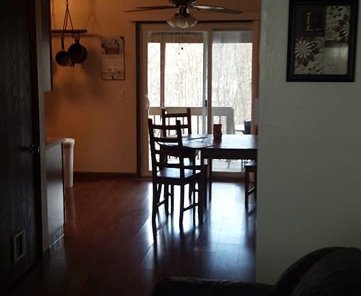 view of dinning room and sliding glass doors from the living