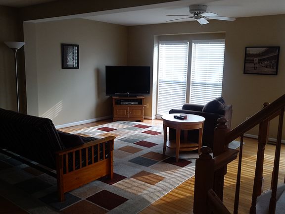 Large family room with hardwood floors