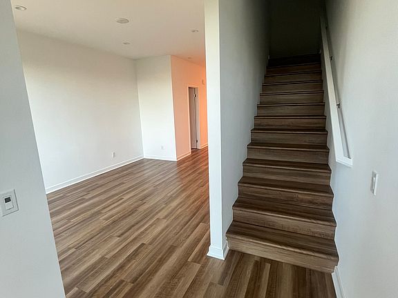 Nook, living room and stairs to the bedrooms.