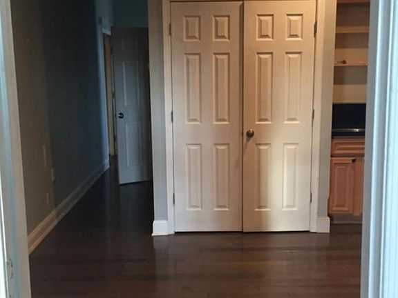 view from master into kitchen (w/d behind these doors)