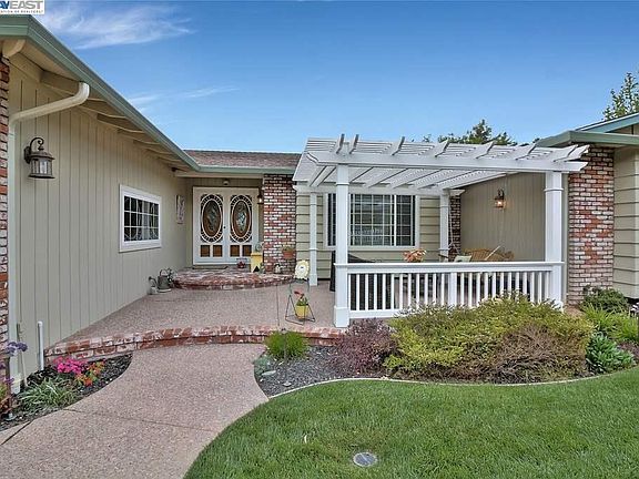 Front entrance with patio