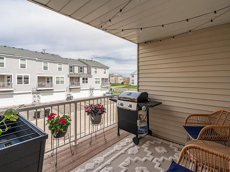 main floor - porch with allowable grill on patio (grill may stay if desired)