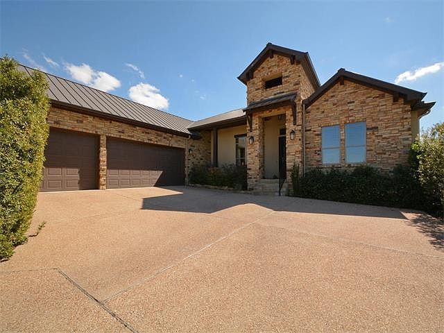 239 Golden Bear Drive is located in the gated, Flintrock Falls Country Club community.