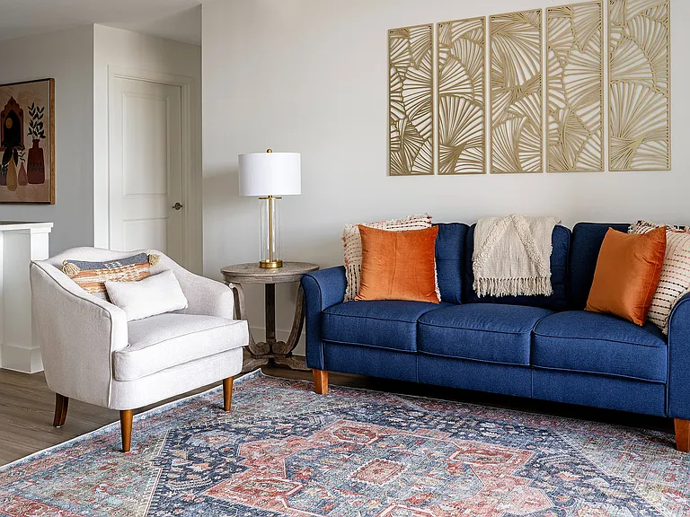 Immerse yourself in this chic living room oasis, where elegance meets comfort.