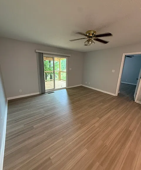 Living Room with sliding door to brand new back deck
