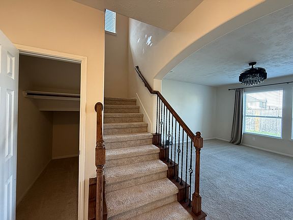 Storage closet next to the stairs.