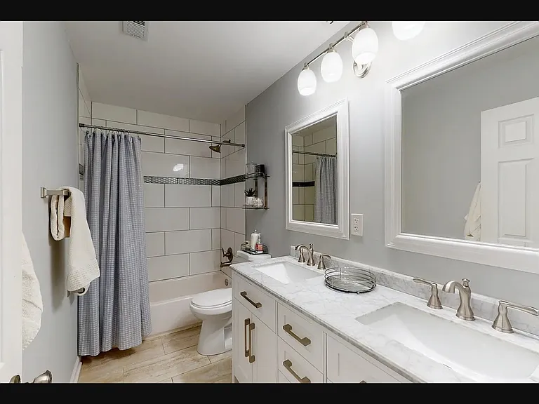 Main Bathroom. Double Sink. With Tub/Shower.