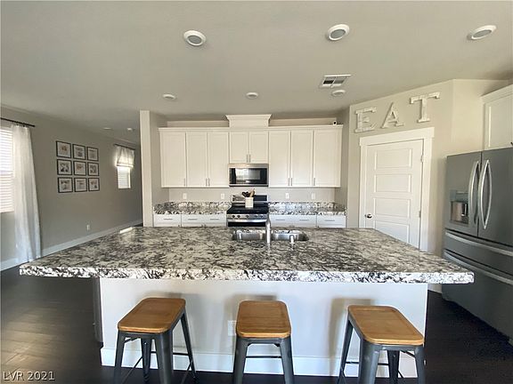 3rd image of 9742 W Cluny Ave