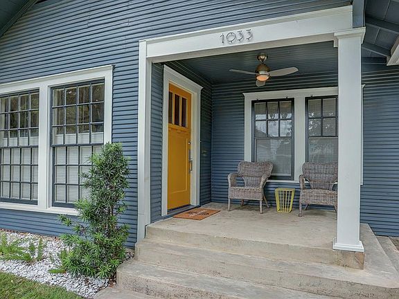 PORCH: The inviting front porch welcomes you in.