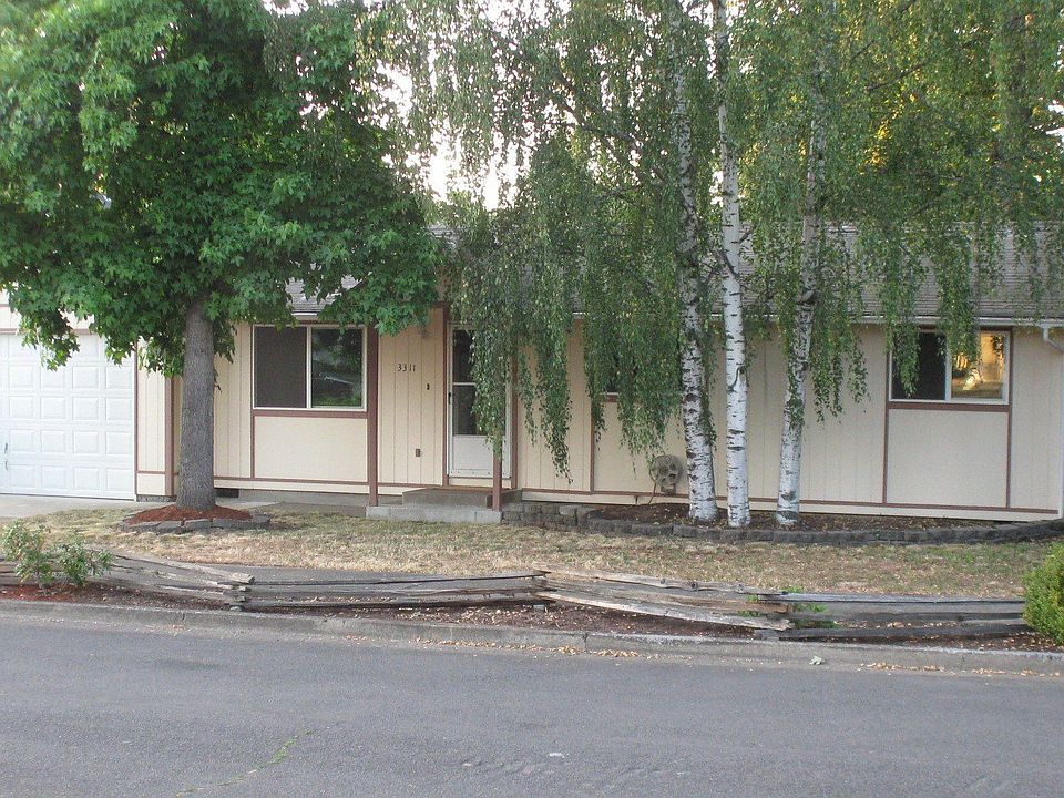 Five mature trees provide beauty and shade to the South facing home.