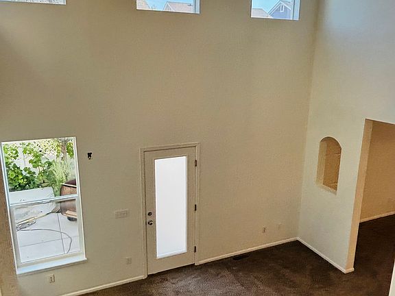 Living room with vaulted ceiling