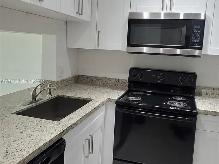 7435 Woodmont Ter #202 — Photo 13