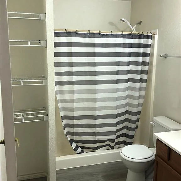 Full Bath with Large shower off Primary bedroom