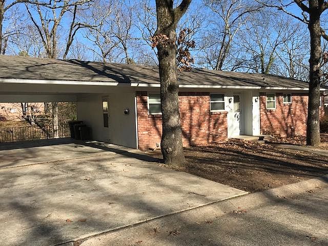 Brick exterior double carport