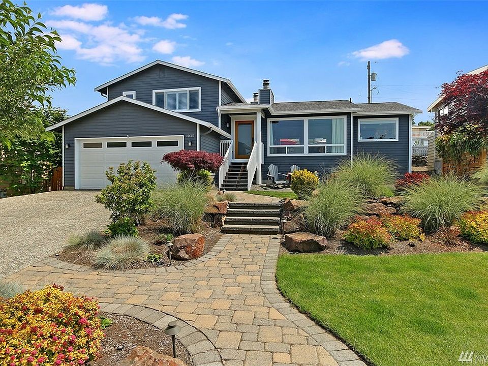 Beautifully updated landscaping with automatic lighting and irrigation.