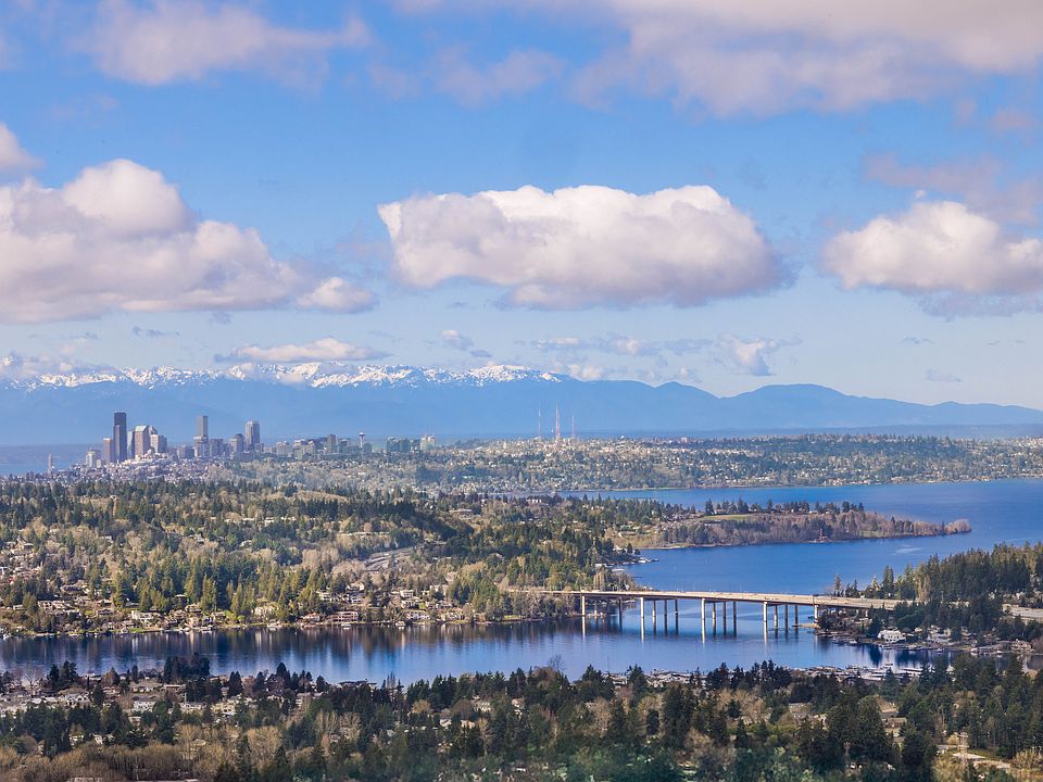 This aerial shot showcases breathtaking views of the city skyline, with a mix of urban energy and waterfront beauty.