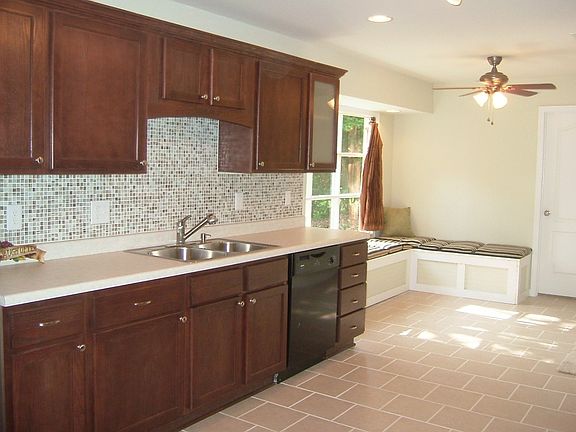 Kitchen w/ Glass Tile Backsplash
