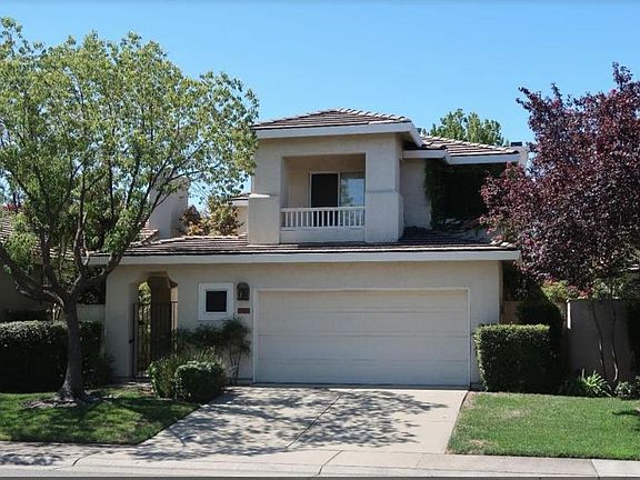 front of the house and upstairs balcony.