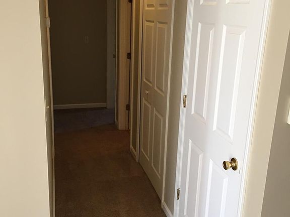 Hallway with Coat Closet, Attic Dropdown and 2nd Full Bath