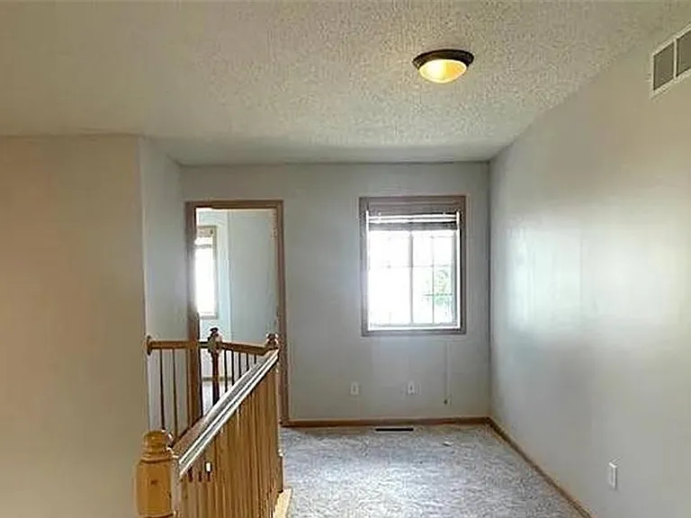 6597 Olive Ln N — Photo 13