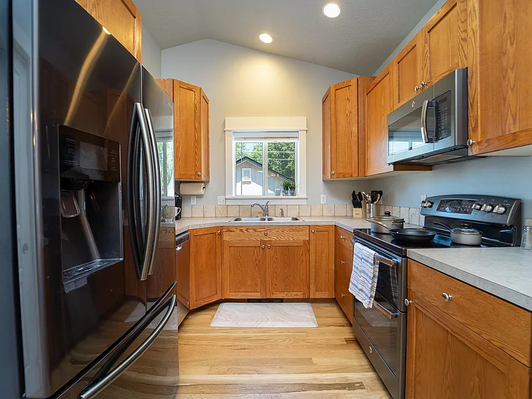 Kitchen. Refrigerator stays.