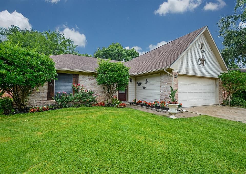 Curb appeal galore! Immaculate landscaping and mature trees give this charming home a welcoming feel from the moment you pull up.