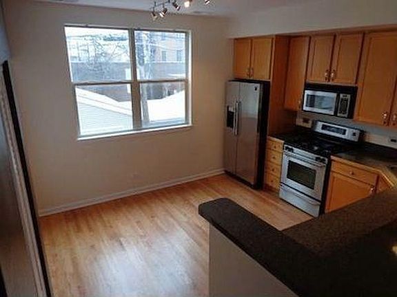 3rd image of 6951 N Western Ave Unit F