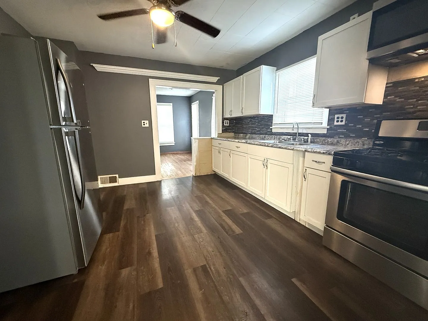 Spacious 2BR Home | Fenced Yard + Detached 2-Car Garage — Photo 2