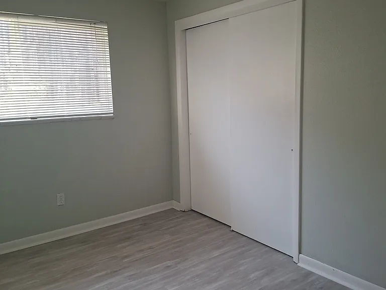 Shows closet in bedroom.