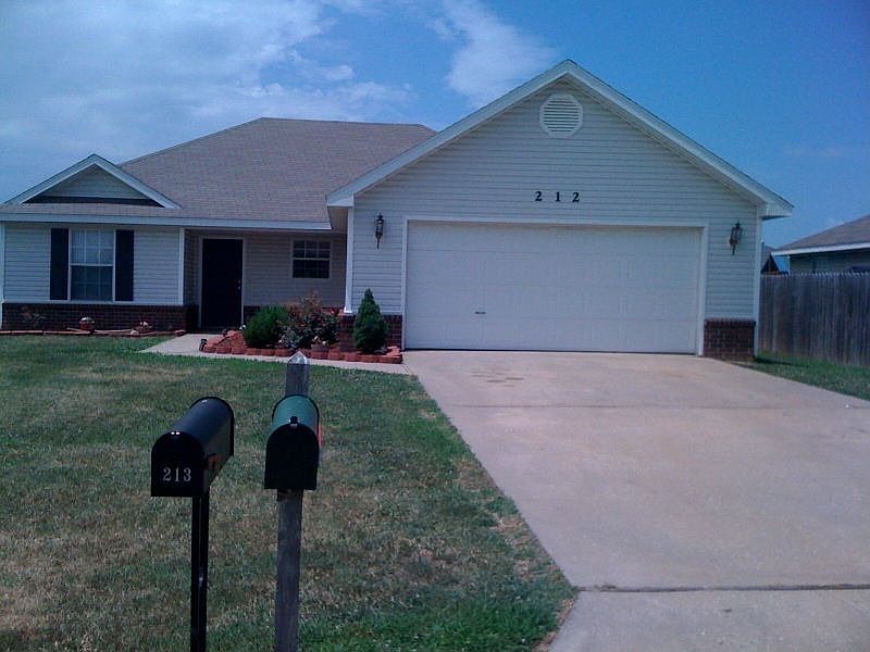 Front of home not pictured is large yard to the left.