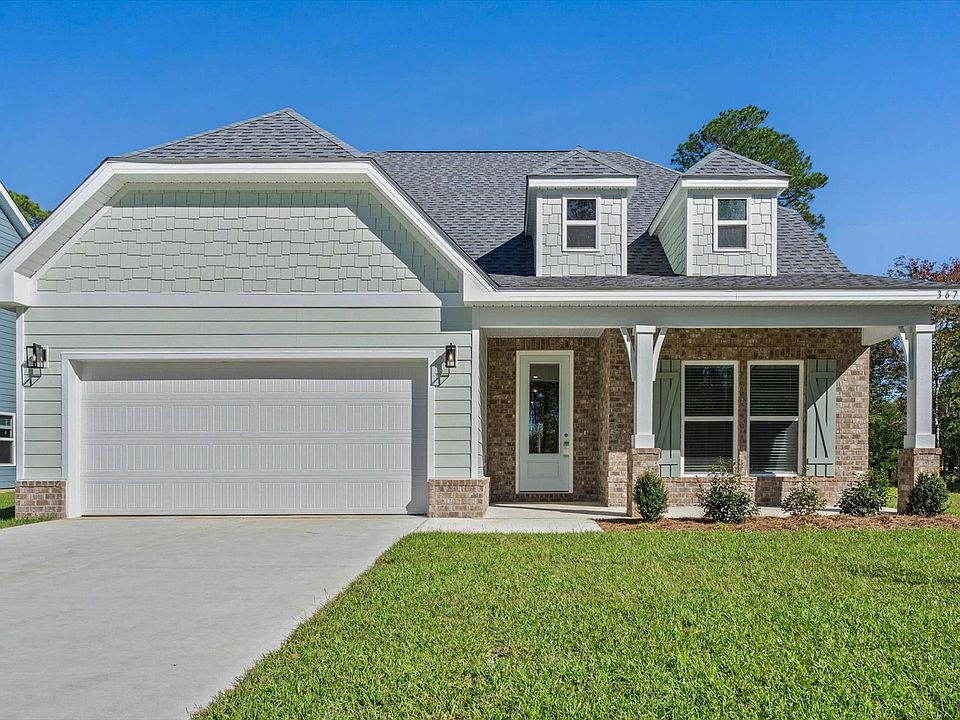 Dune front exterior at a Meritage Homes community in Ocean Springs, MS.