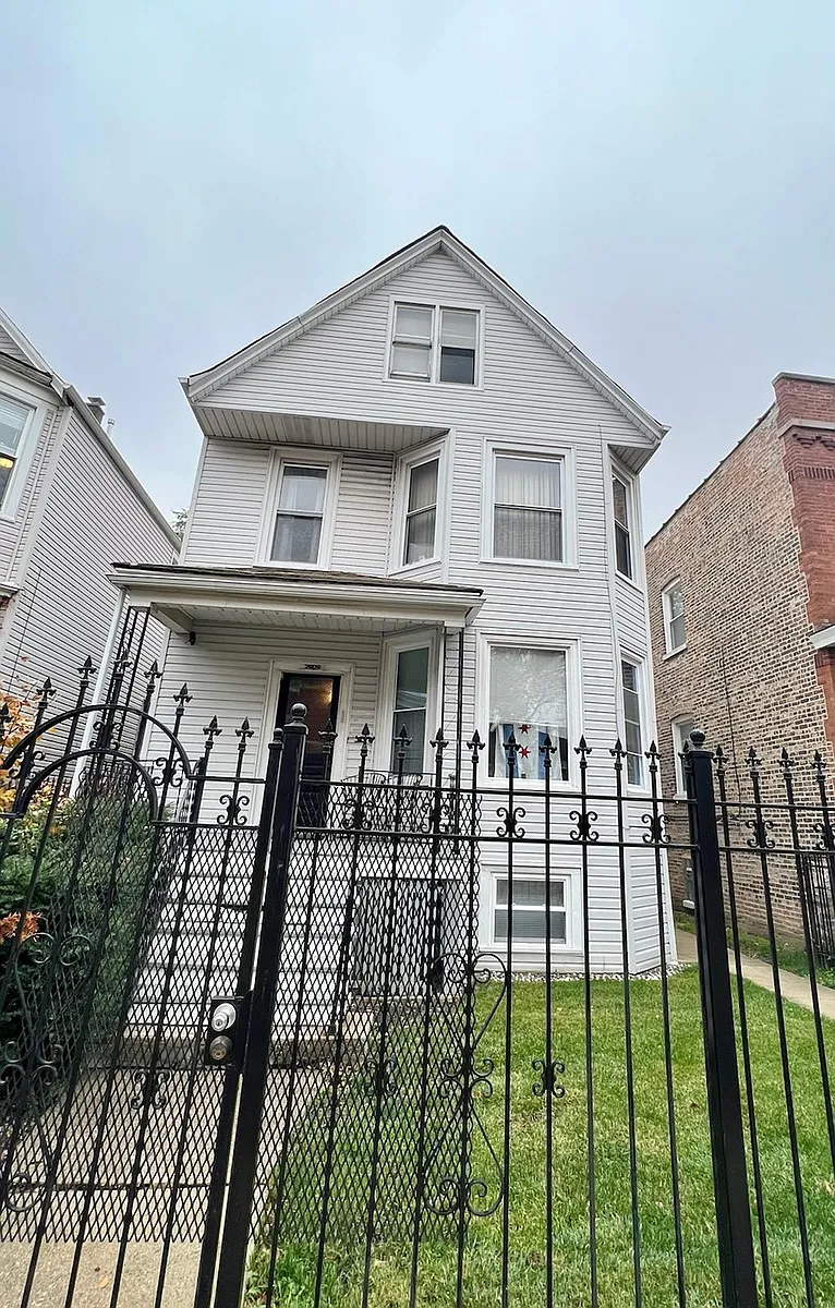 Photo 1 of 16 - 2909 N Lawndale Ave #G - Chicago, IL Front Exterior of Home - 2909 N Lawndale Ave #G