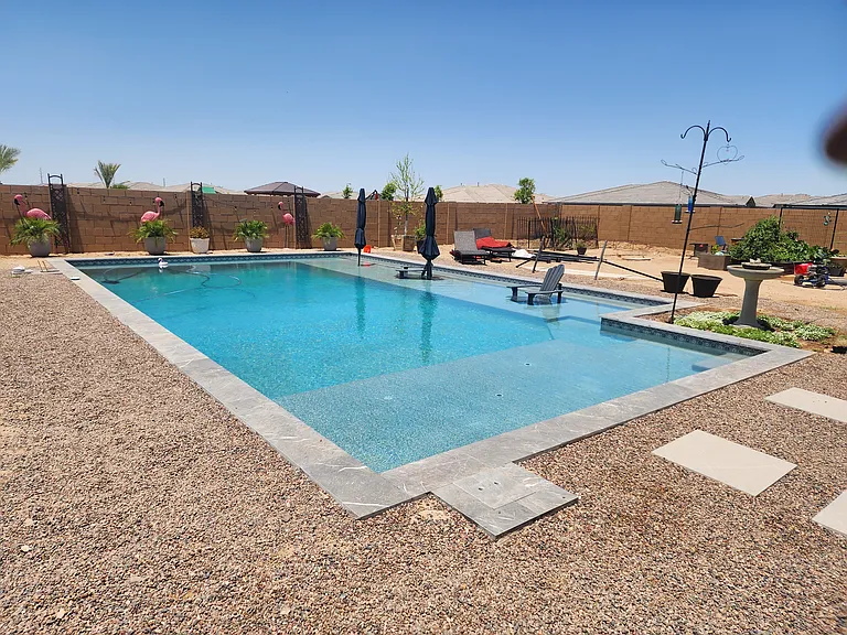 EXTRA LARGE POOL
40ft x 27ft POOL AREA
TWO BAJA STEPS