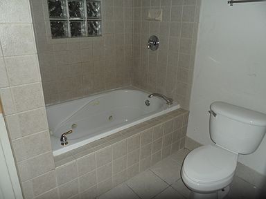 Bathroom with jetted tub & shower