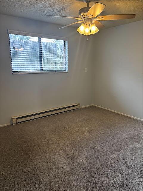 Custom blinds and easy care carpet.